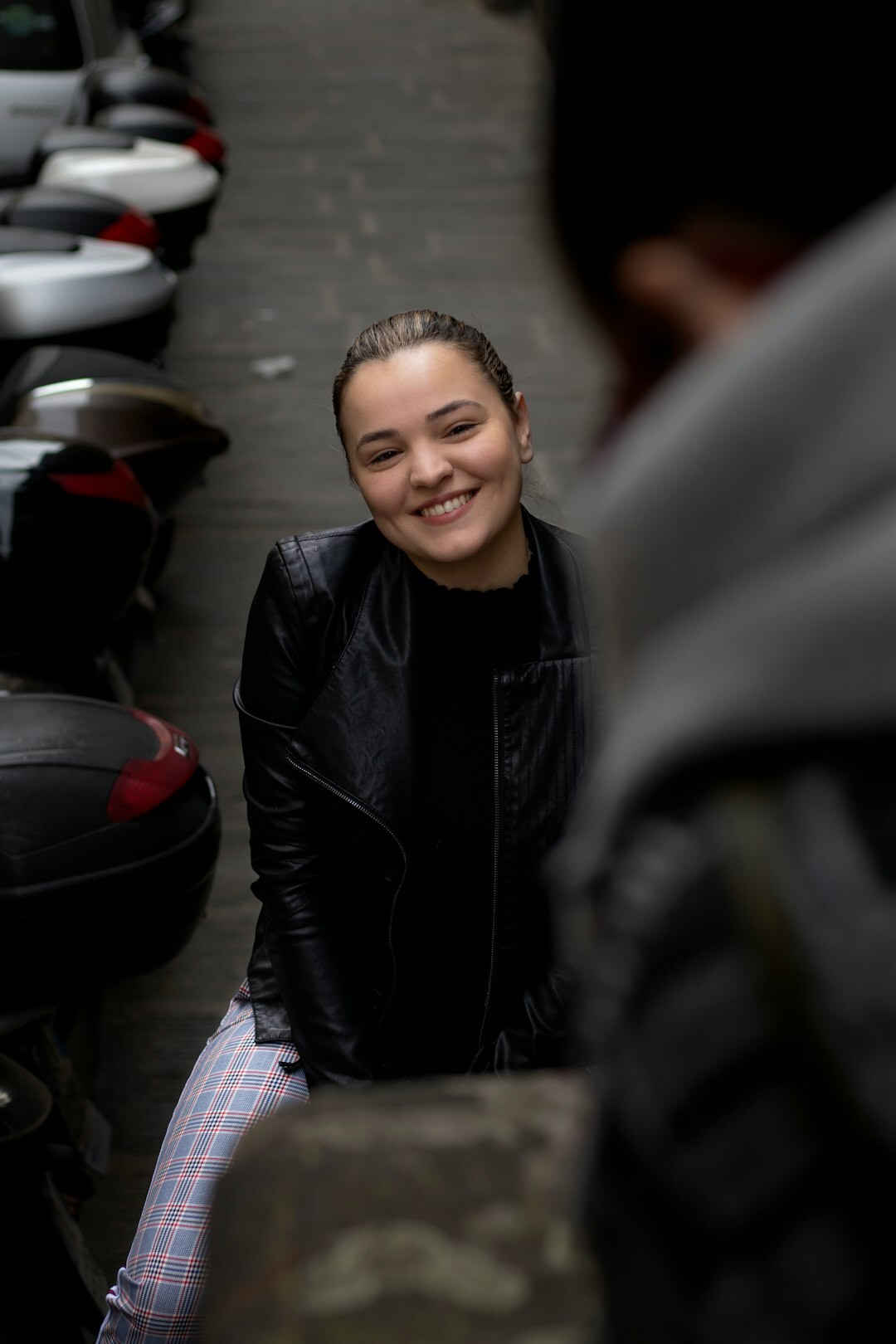 Studio portrait of a young European woman market analyst smiling